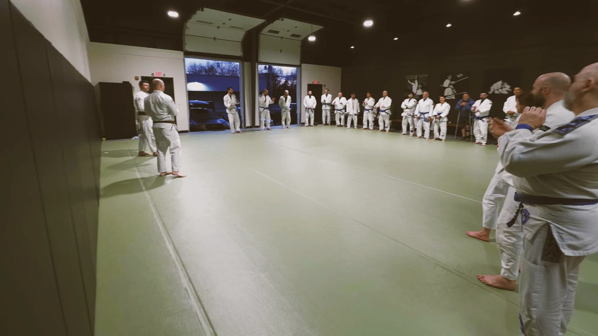 Students lining up and bowing in at the start of class.
